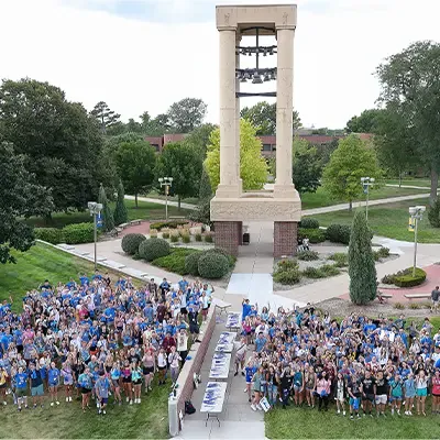 image of students posing together at a welcome home event